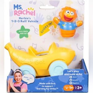 Rachel Pull-Back Banana Ride-On Toy in Yellow & Light Blue with Orange Character